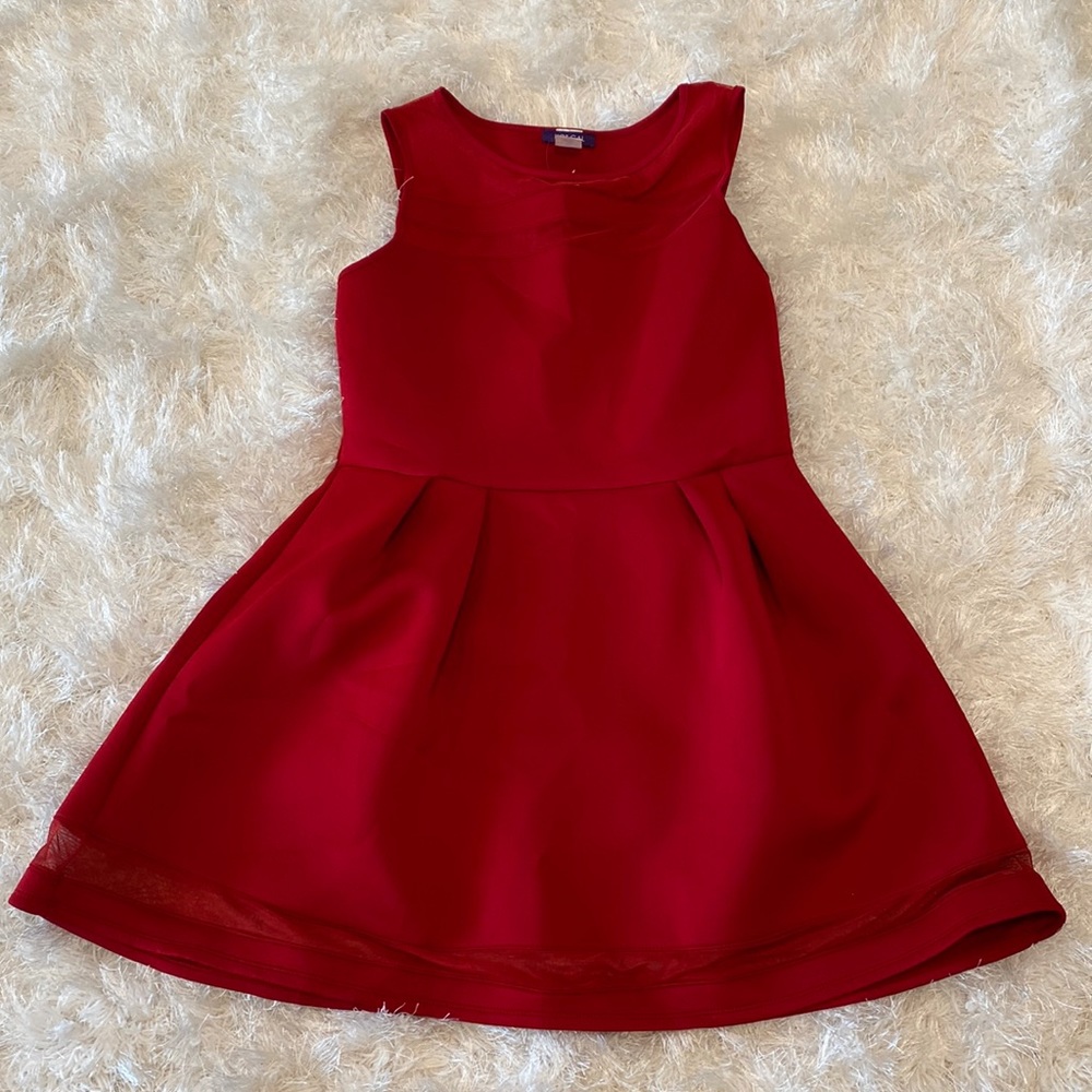 Brand new/Never worn. See through top and bottom